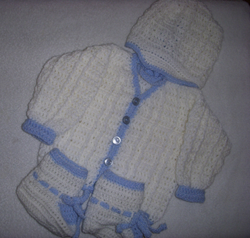 Hand crocheted baby clothes by Grace