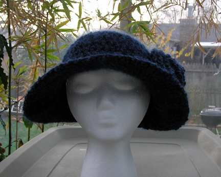 wide brim crochet hat with flower